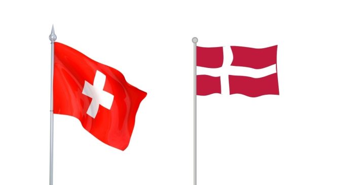 Which country has a red flag with a white cross?